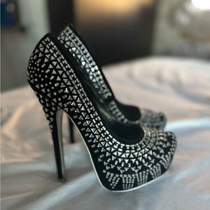 Black studded pumps